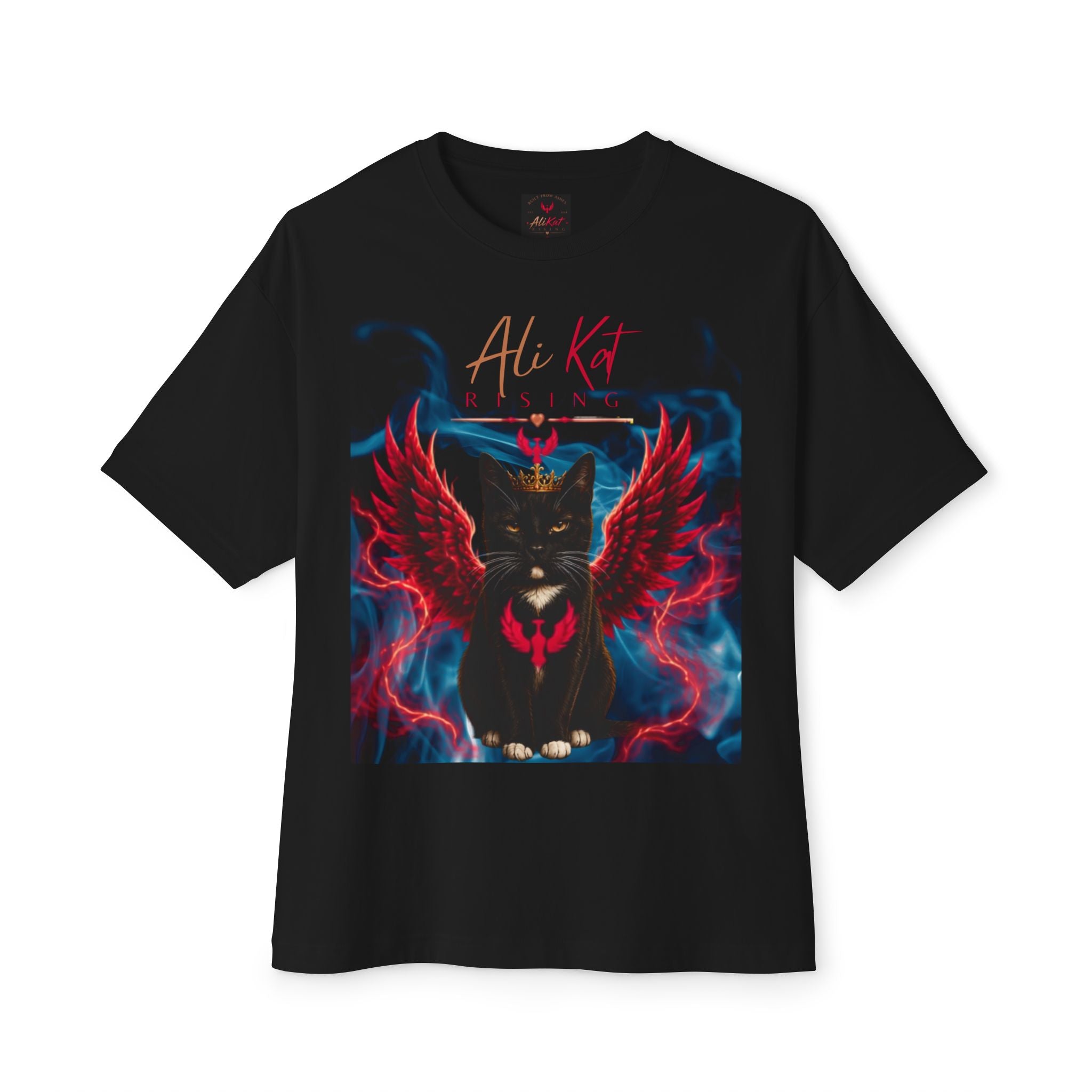 Introducing the Phoenix Season: Vol. 1 Signature Oversized Tee by AliKat Rising—a premium heavyweight cotton unisex t-shirt showcasing a bold black cat with vibrant red wings, crowned and highlighted with glowing blue and red details. Above, "Ali Kat RISING" stands out in striking red and gold script, making this a true Phoenix Season centerpiece.