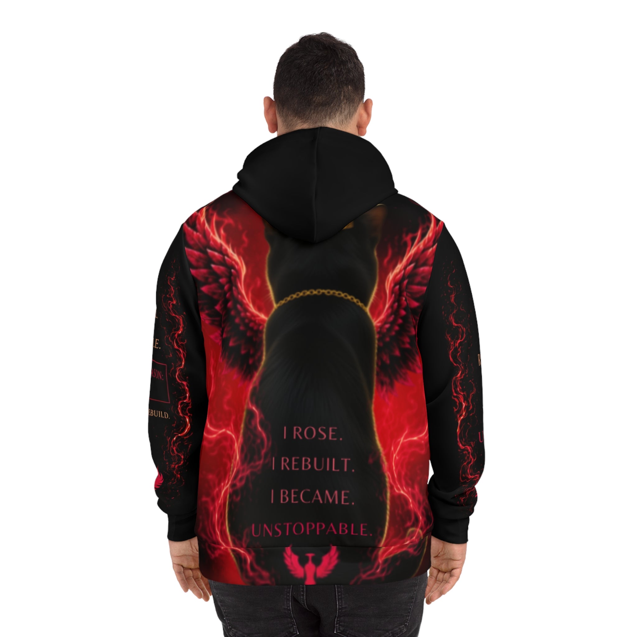 A person is seen from behind wearing the Phoenix Wings Hoodie — AliKat Flame Graphic Pullover by AliKat Rising. This black hoodie features striking red angel wings and glowing red accents, with bold text on the back: "I ROSE. I REBUILT. I BECAME. UNSTOPPABLE." Available in sizes S, M, L, XL, and 2XL; please refer to exact width and length measurements for your perfect fit.