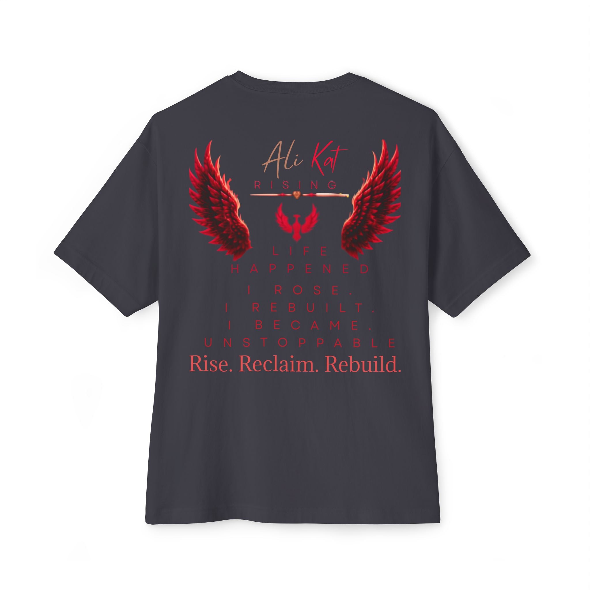 Introducing the Phoenix Season: Vol. 1 Signature Oversized Tee by AliKat Rising—a black unisex t-shirt crafted from premium heavyweight cotton. This bold statement piece features vibrant red angel wings and the empowering message: Ali Kat Rising. Life happened. I rose. I rebuilt. I became unstoppable. Rise. Reclaim. Rebuild, all centered on the back for maximum impact on your journey of transformation.