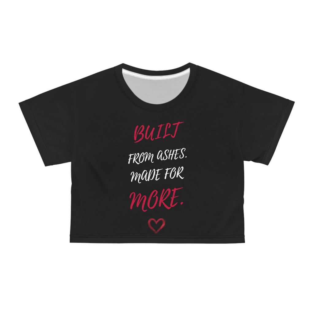AliKat Rising’s Phoenix Wings Crop Tee — "Built from Ashes, Made for More" Inspirational Women's Top — features bold red and white text that reads BUILT FROM ASHES. MADE FOR MORE. with a small red heart underneath. Crafted from lightweight polyester, this cropped tee blends comfort and style for any occasion.