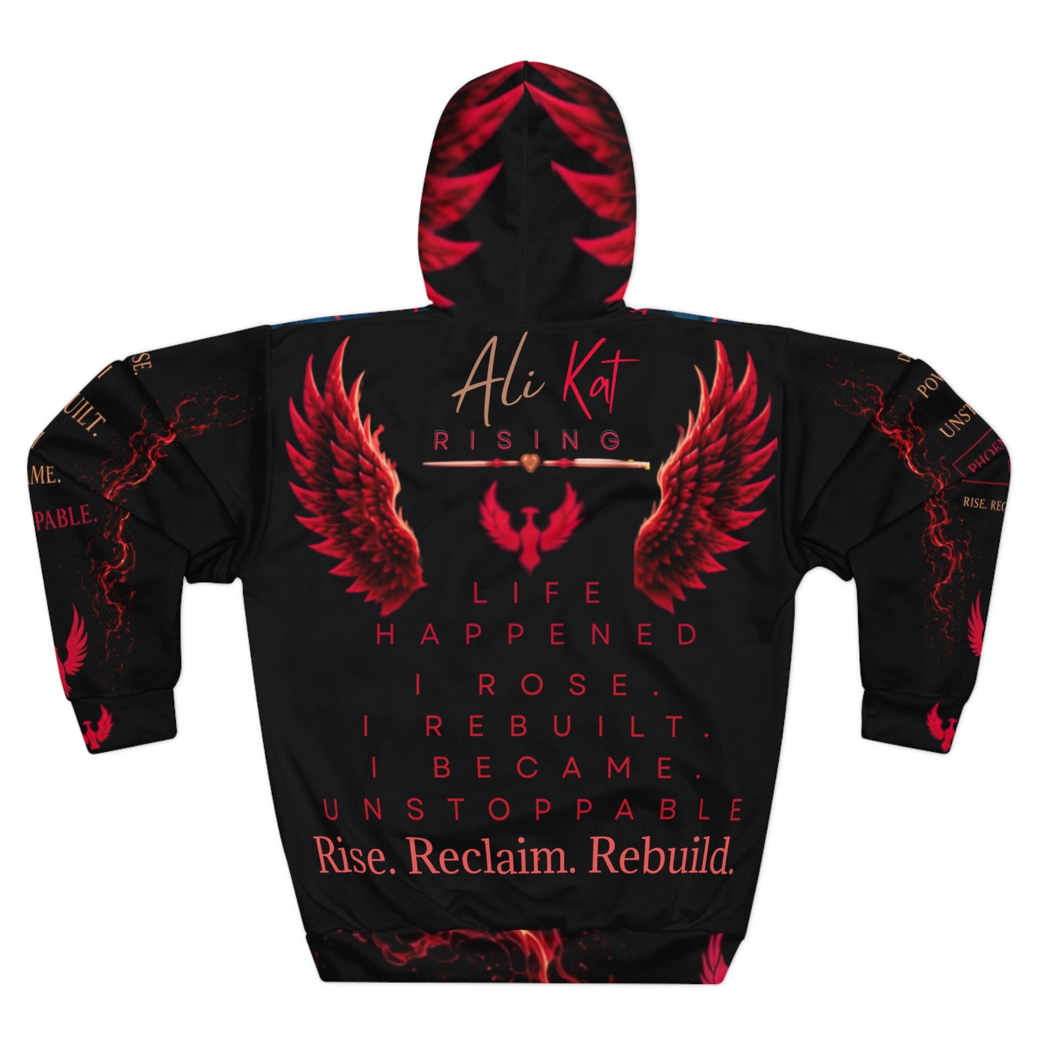 The Phoenix Vol. 1 Premium Motivational Hoodie from AliKat Rising features bold red wing graphics and the empowering text: “Life happened. I rose. I rebuilt. I became unstoppable. Rise. Reclaim. Rebuild.” The design includes “Ali Kat” at the top with “Rising” right below it. Available in sizes XS to 2XL—please consult the size chart for ideal fit and clothing length.