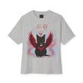 Introducing the Phoenix Season: Vol. 1 Signature Oversized Tee from AliKat Rising—a gray unisex t-shirt featuring a striking black cat with red wings and glowing eyes, set amidst blue and red smoke effects. The words "Ali Kat RISING" appear above the cat, and the premium heavyweight cotton construction ensures maximum comfort and standout style.