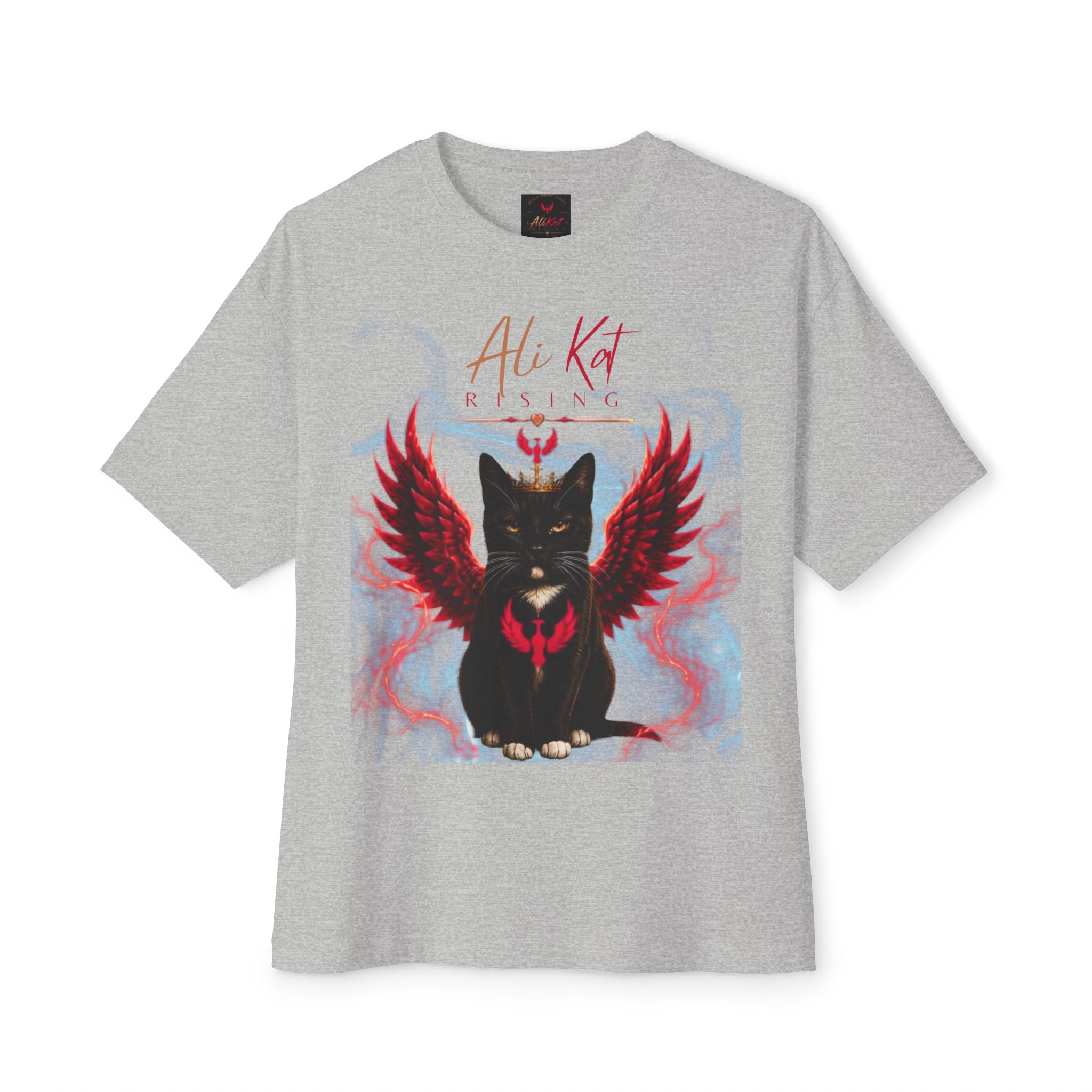 Introducing the Phoenix Season: Vol. 1 Signature Oversized Tee from AliKat Rising—a gray unisex t-shirt featuring a striking black cat with red wings and glowing eyes, set amidst blue and red smoke effects. The words "Ali Kat RISING" appear above the cat, and the premium heavyweight cotton construction ensures maximum comfort and standout style.