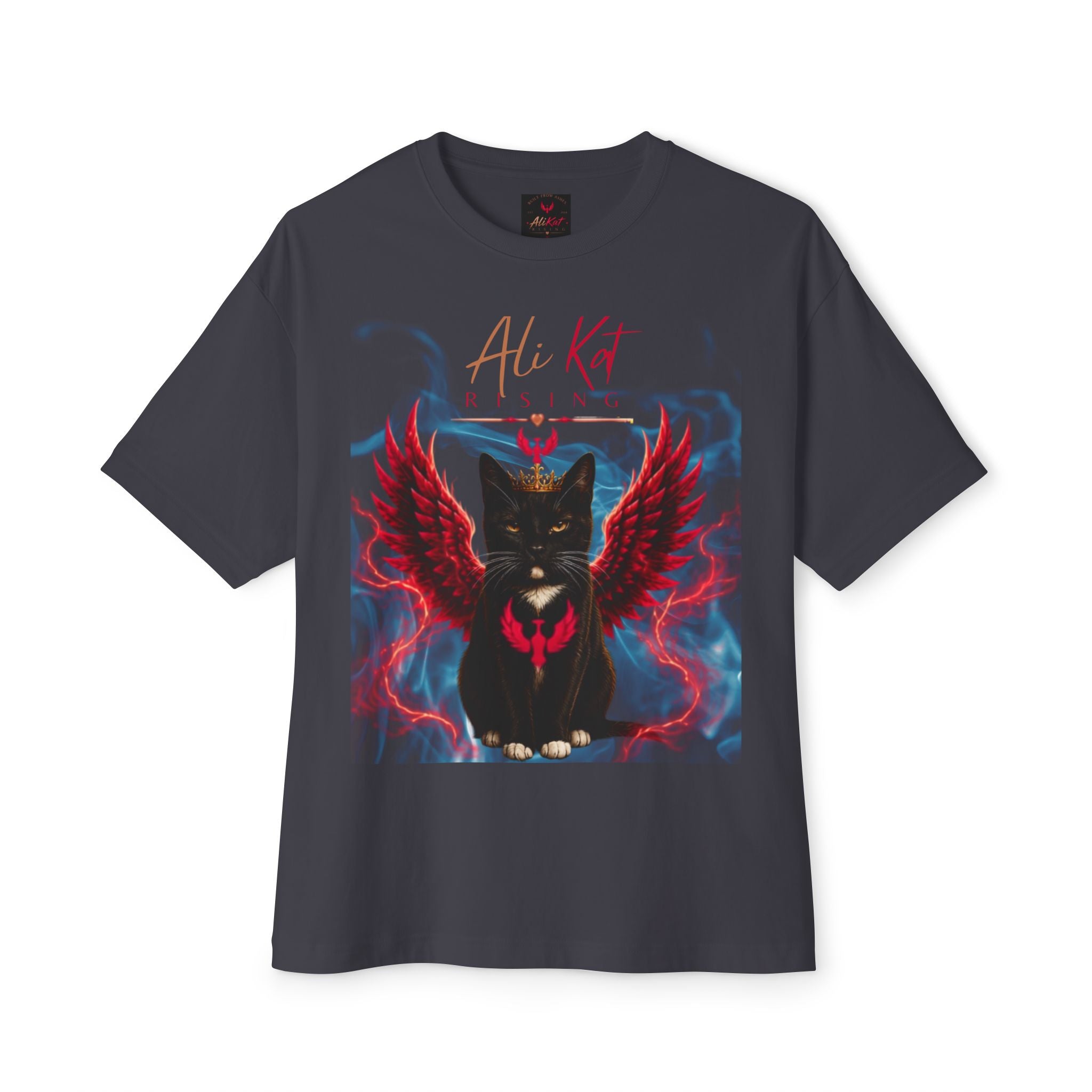 Introducing the Phoenix Season: Vol. 1 Signature Oversized Tee by AliKat Rising—a dark, oversized unisex t-shirt crafted from premium heavyweight cotton. This bold piece showcases a striking graphic of a black cat with red, fiery wings and a crown, set beneath the stylized text "Ali Kat Rising.