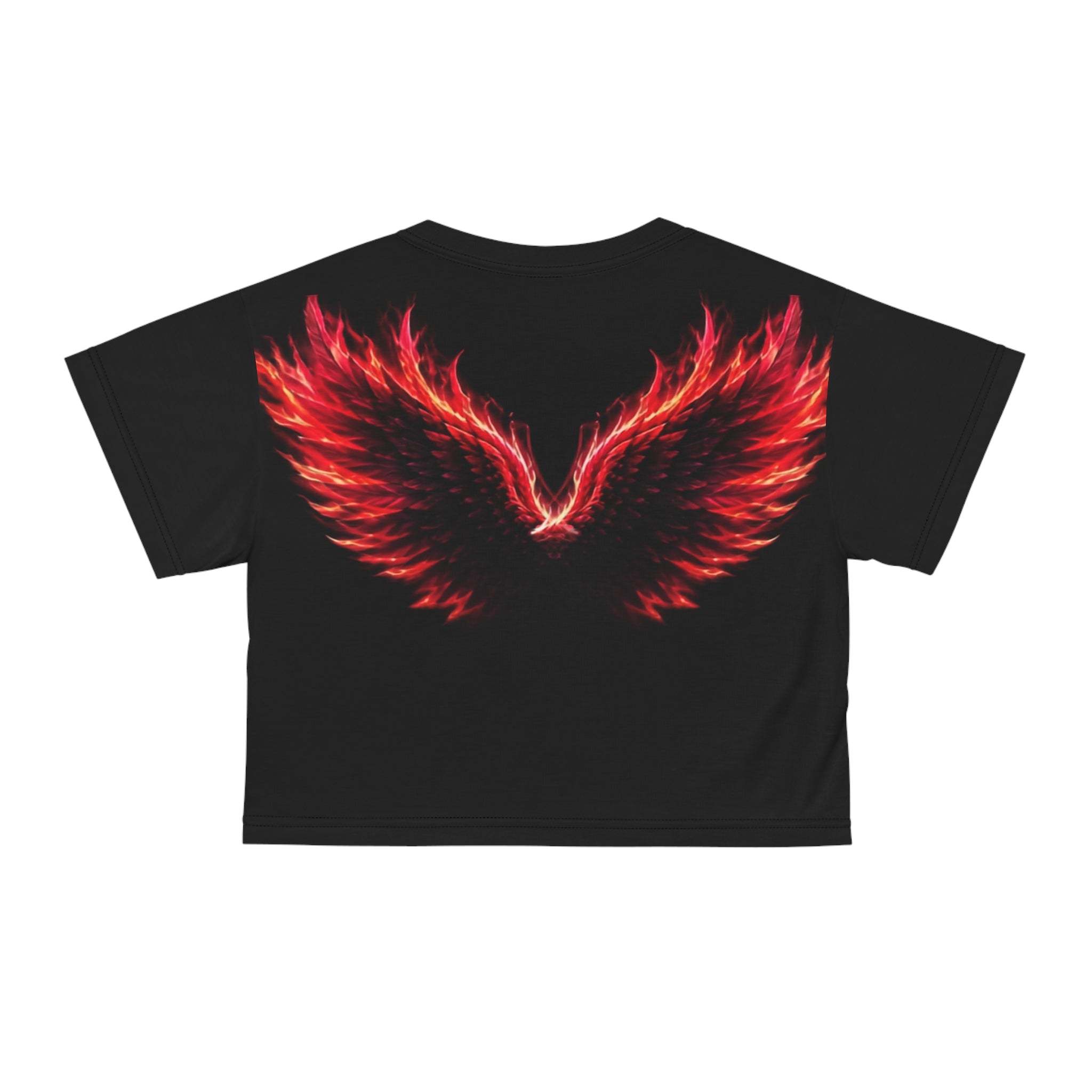 The AliKat Rising Phoenix Wings Crop Tee — "Built from Ashes, Made for More" Inspirational Women's Top features a stunning all-over print of red and orange flaming wings across the back, creating a bold, fiery effect against the dark fabric. This lightweight polyester cropped shirt is designed for both comfort and style.