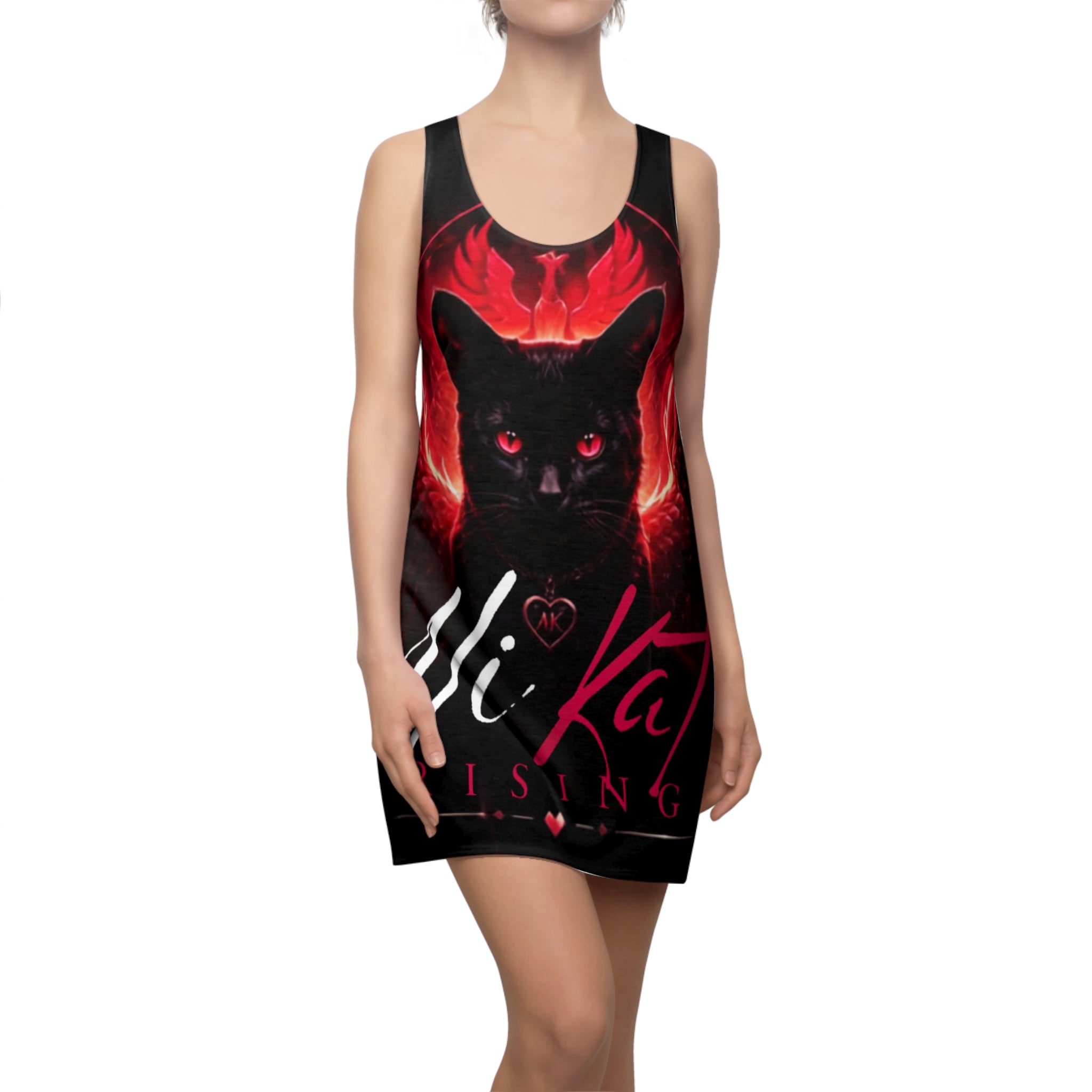 A woman wears the Phoenix Vol. 1 Racerback Dress by AliKat Rising, an all-over print design showcasing a black cat with red eyes and fiery wings, finished with bold “AliKat Rising” text in white and pink on the front.